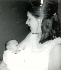 This is my mother, holding me right after I was born. Most people tend to think that this is ME holding a baby.